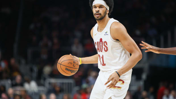 Mar 6, 2024; Atlanta, Georgia, USA; Cleveland Cavaliers center Jarrett Allen (31) handles the ball against the Atlanta Hawks in the first quarter at State Farm Arena.